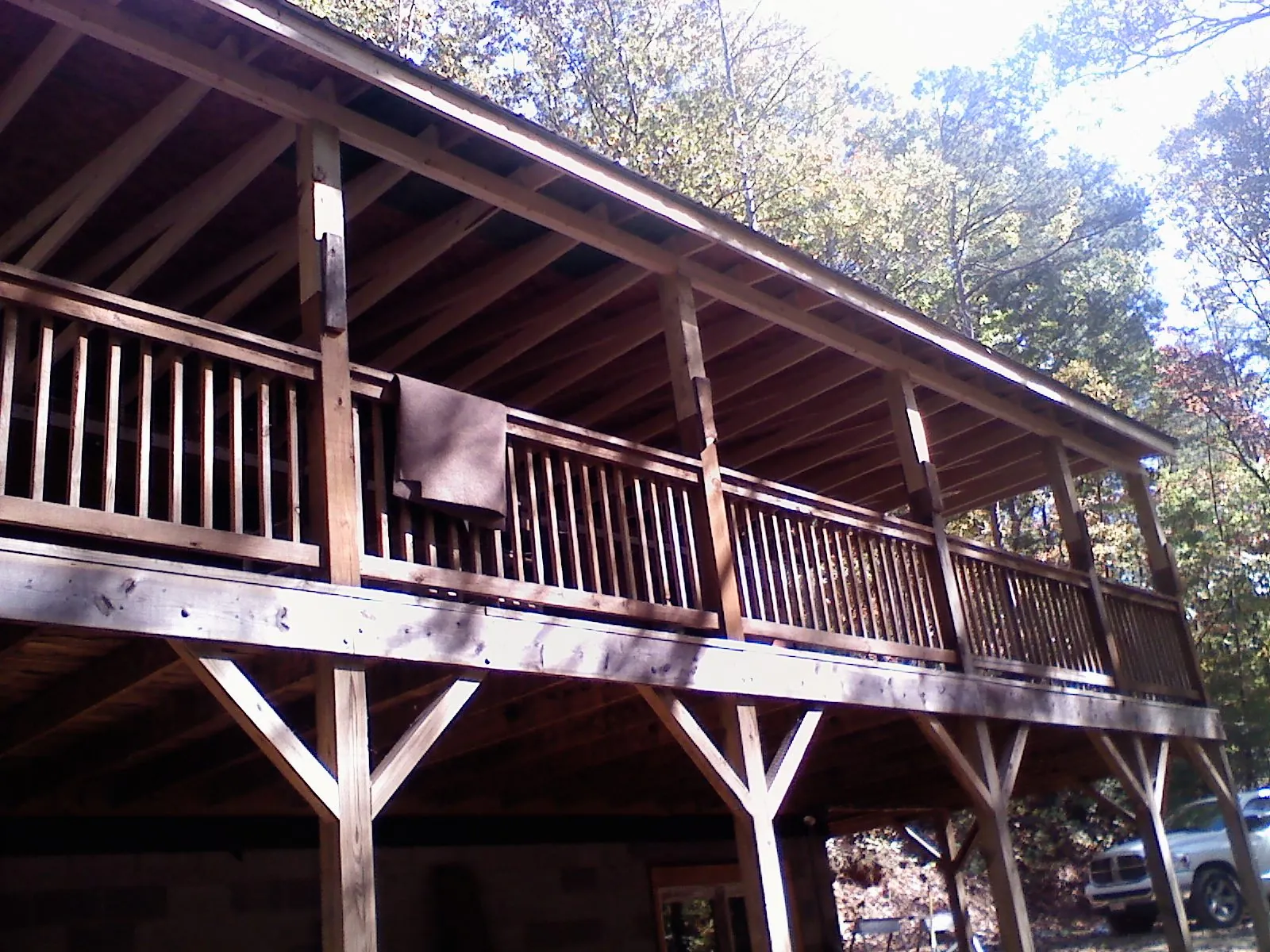 Timber framing under a new elevated porch and deck — Roof Leak Repair in Delco by Roofing Brothers